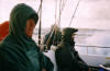 John Bentley & Pete Tadman try to stay dry en route to location