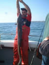 Our very own "Mr Conger" Nigel Davies staring out a nice 25lb Conger taken onboard Sabre Tooth, a relatively small eel by Nigel's usual standards