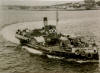This is an older ferry, the Alumchine that ferried passengers and vehicles between Hobbs Point & Neyland from the 1930's until the 1950's. This was a paddle driven ferry and some more interesting facts about this period of local history can be found at http://www.pembrokedock.org/h_transport.htm